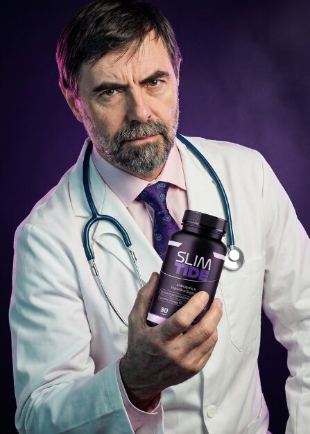 Medical professional in a white lab coat holding a bottle of SlimTide, verifying its formula quality and manufacturing standards.